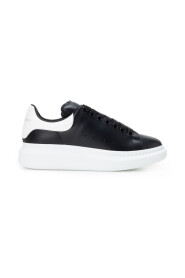 Zwarte lederen sneakers met witte lederen hiel