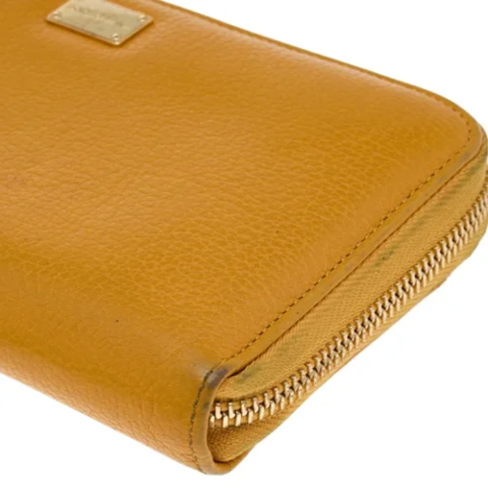 Dolce & Gabbana Pre-owned Leather wallets Yellow Dames