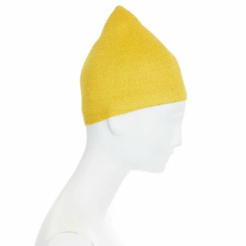 Issey Miyake Pre-owned Polyester hats Yellow Dames