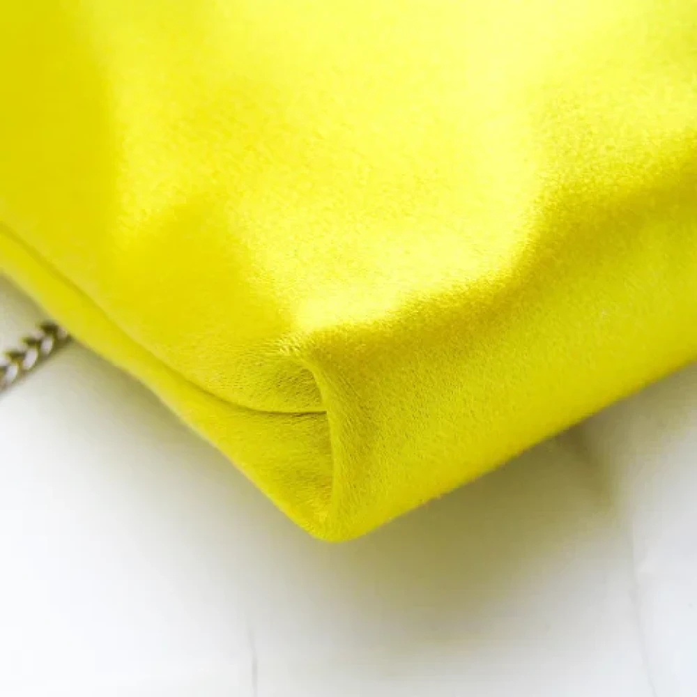 Jimmy Choo Pre-owned Satin clutches Yellow Dames