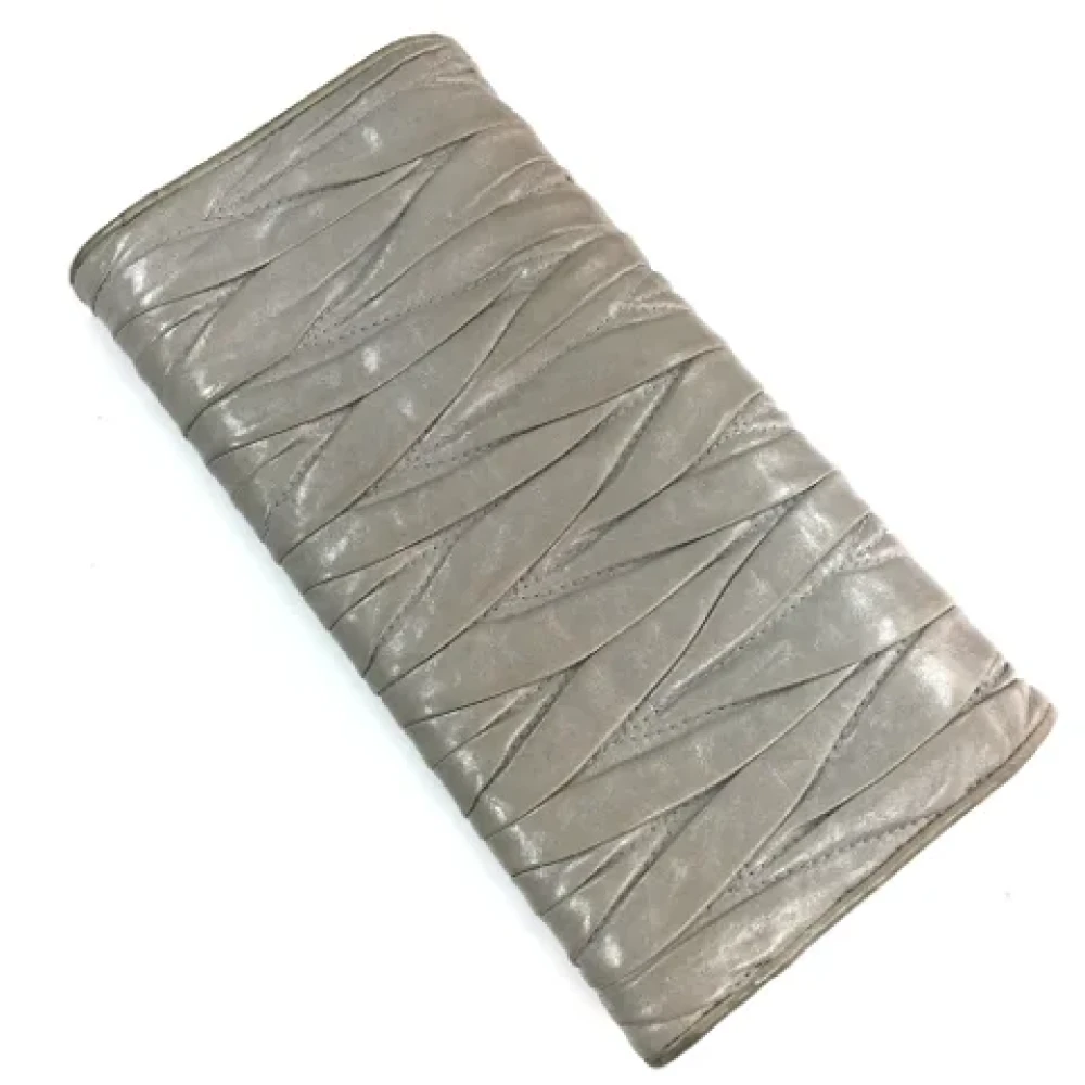 Miu Pre-owned Leather wallets Gray Dames