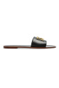 mules-en-cuir-avec-une-application-en-forme-de-logo