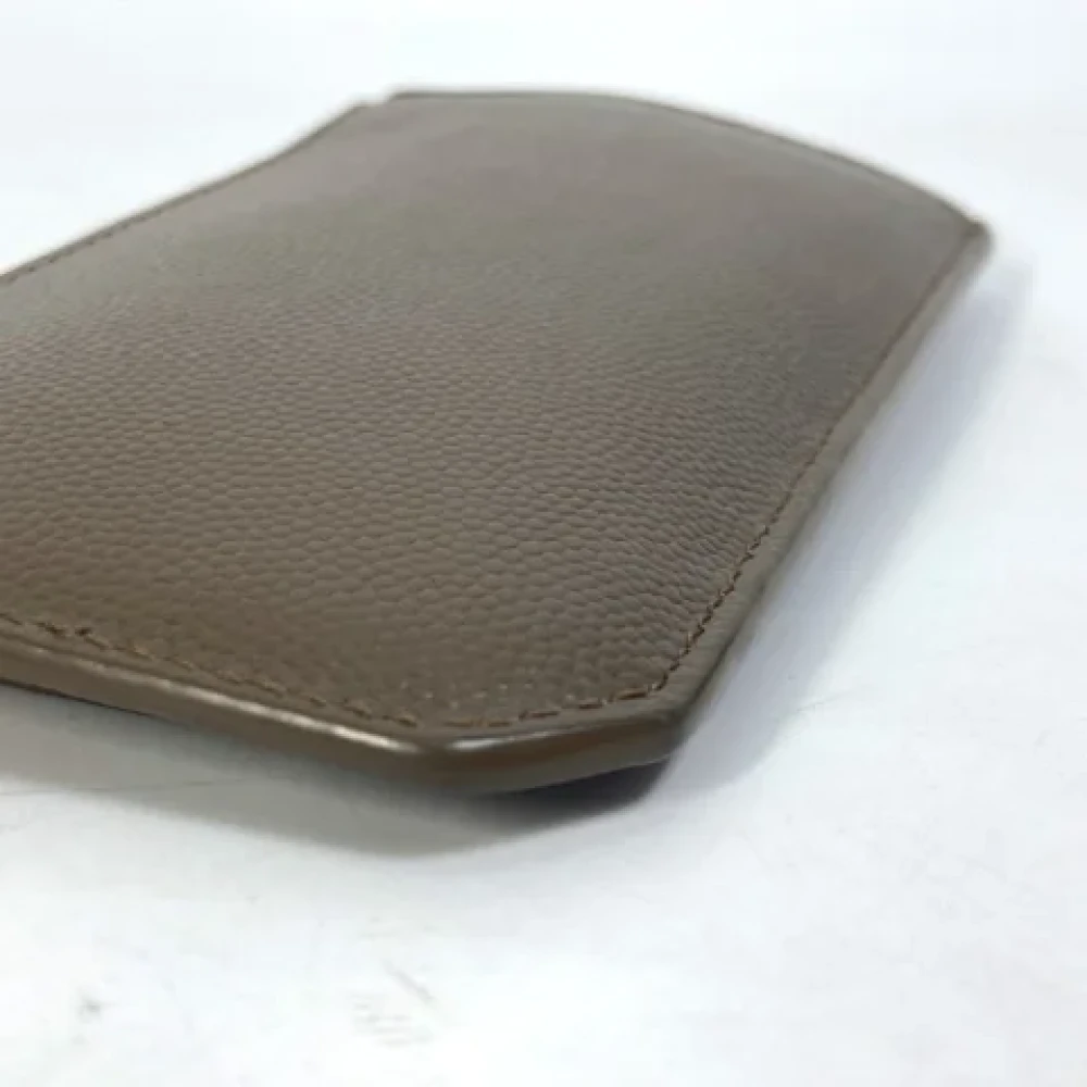Yves Saint Laurent Vintage Pre-owned Leather wallets Brown Heren