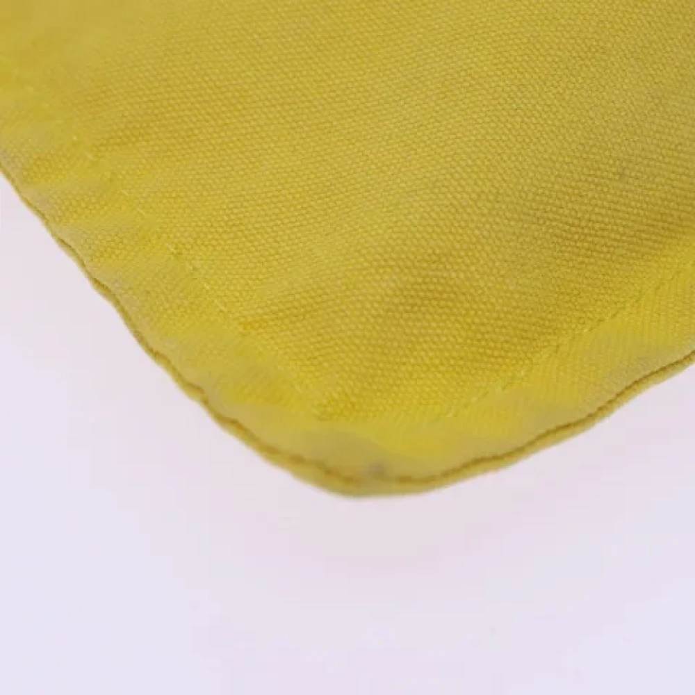 Hermès Vintage Pre-owned Canvas pouches Yellow Dames