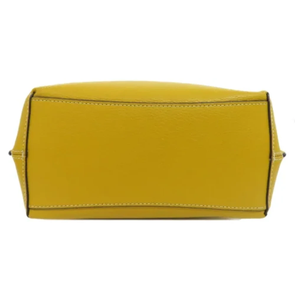 Coach Pre-owned Leather handbags Yellow Dames