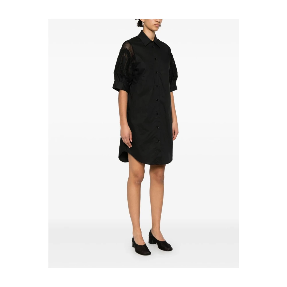 Ermanno Scervino Zwarte knoopjurk met zakken Black Dames