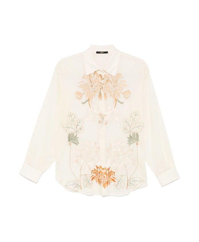 creme-blouse-met-knoopmanchetten