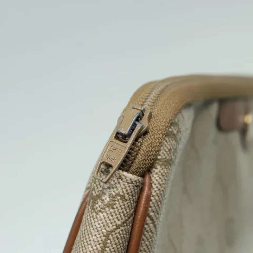 Dior Vintage Pre-owned Canvas clutches Beige Dames