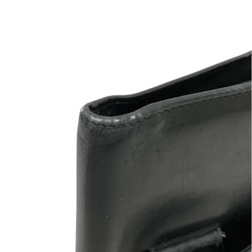 Salvatore Ferragamo Pre-owned Leather wallets Black Unisex