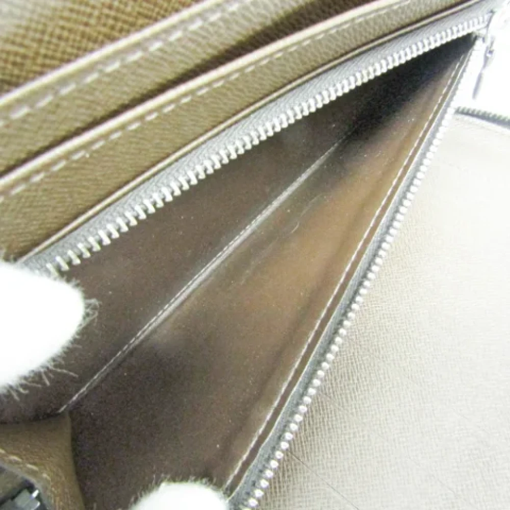 Louis Vuitton Vintage Pre-owned Leather wallets Brown Heren