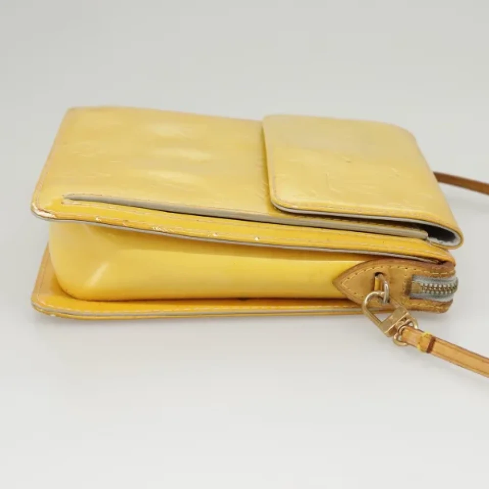 Louis Vuitton Vintage Pre-owned Leather pouches Yellow Dames