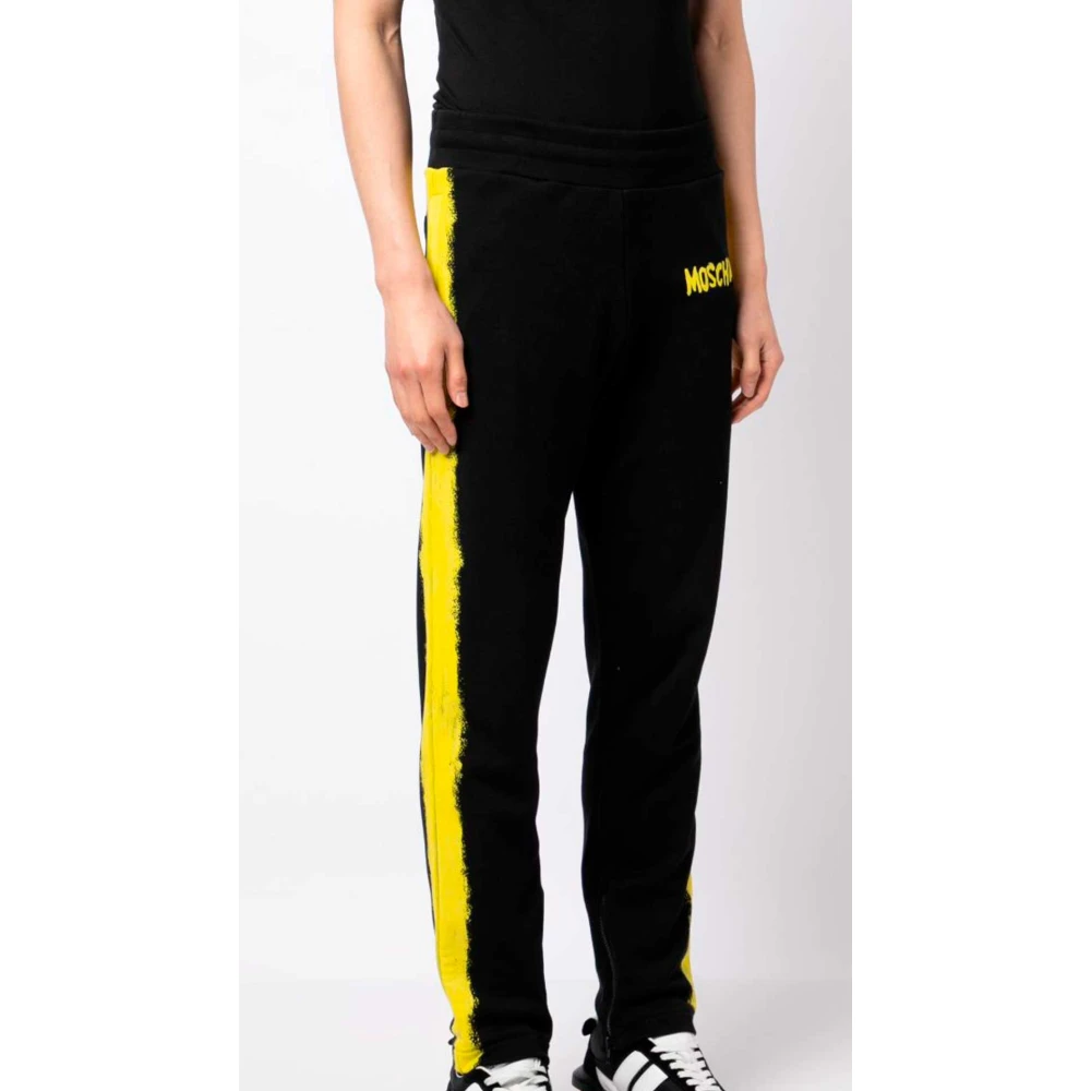 Moschino Zwarte sweatpants met gele verfeffect Black Heren