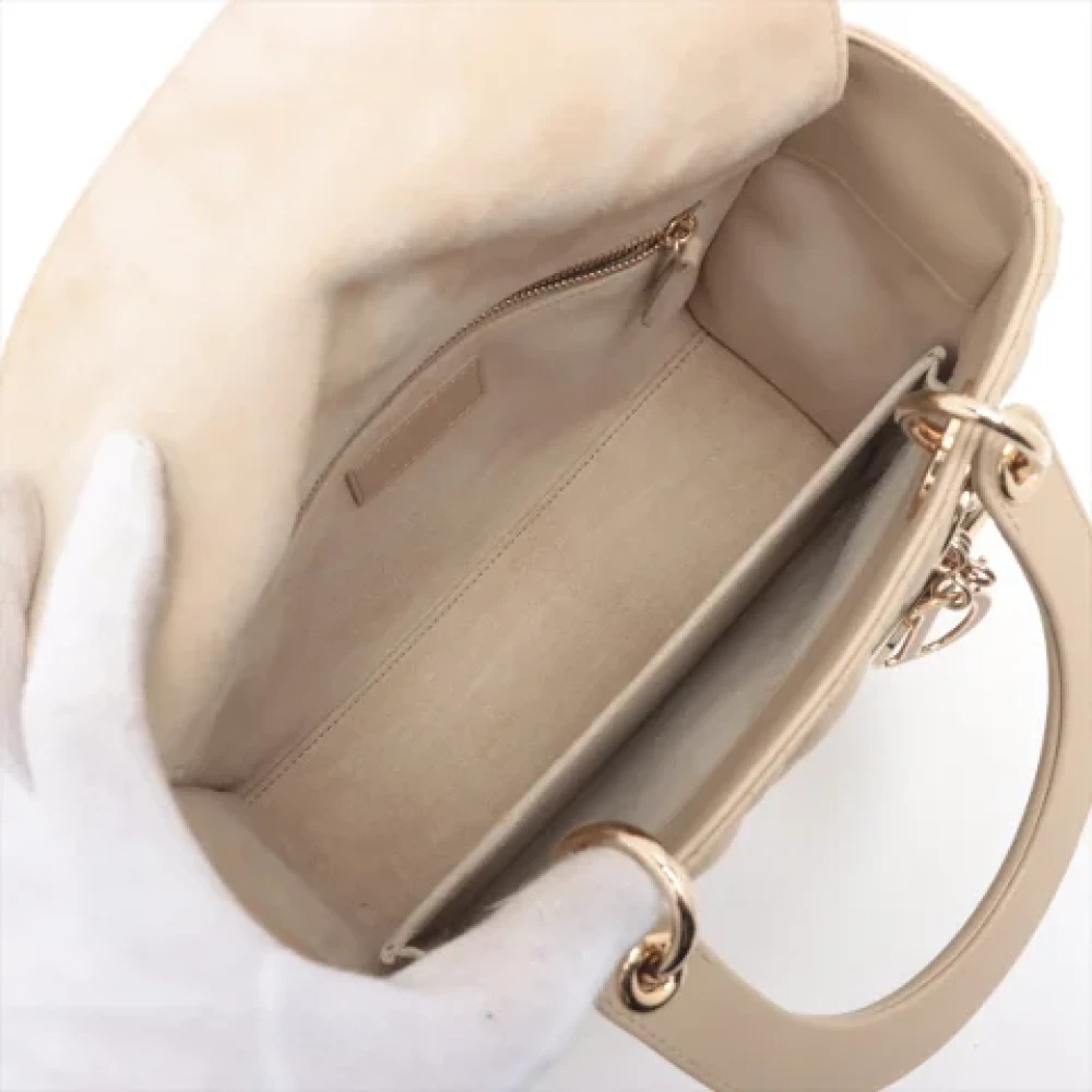 Dior Vintage Pre-owned Leather handbags Beige Dames