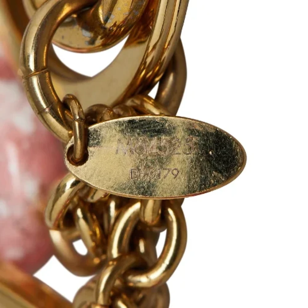 Louis Vuitton Vintage Pre-owned Metal key-holders Yellow Dames
