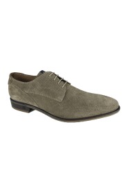Emeric gekleideter Schuh.