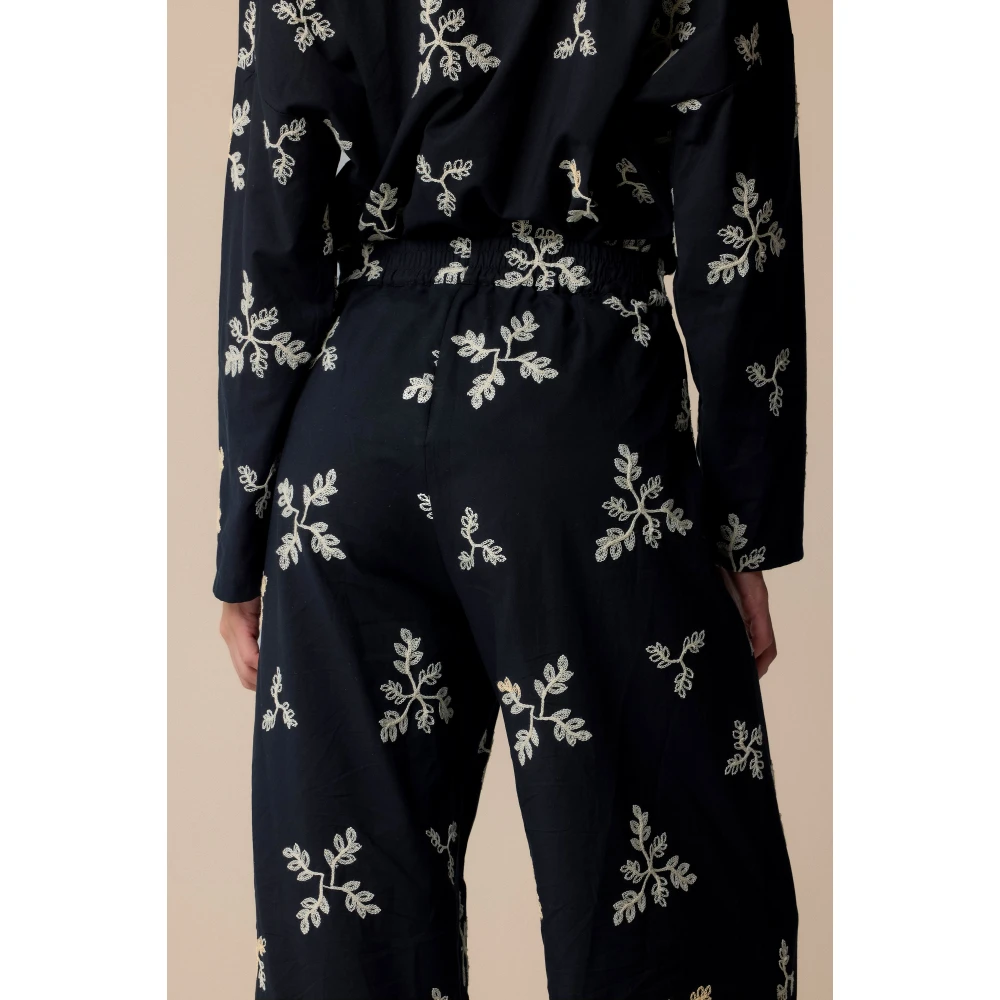 Kocca Palazzo broek met verfijnd all-over patroon Black Dames