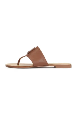 monogrammönstrade läderflip-flops