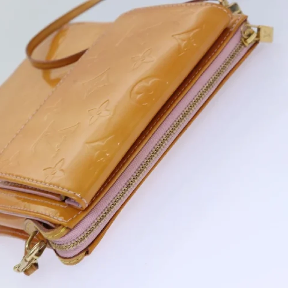 Louis Vuitton Vintage Pre-owned Leather pouches Yellow Dames