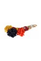porte-cles-multicolore-en-raphia-et-cuir-avec-details-metalliques