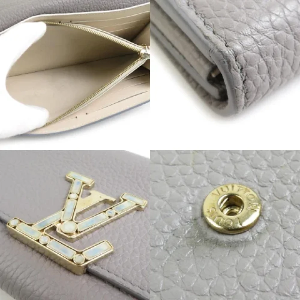 Louis Vuitton Vintage Pre-owned Leather wallets Gray Dames