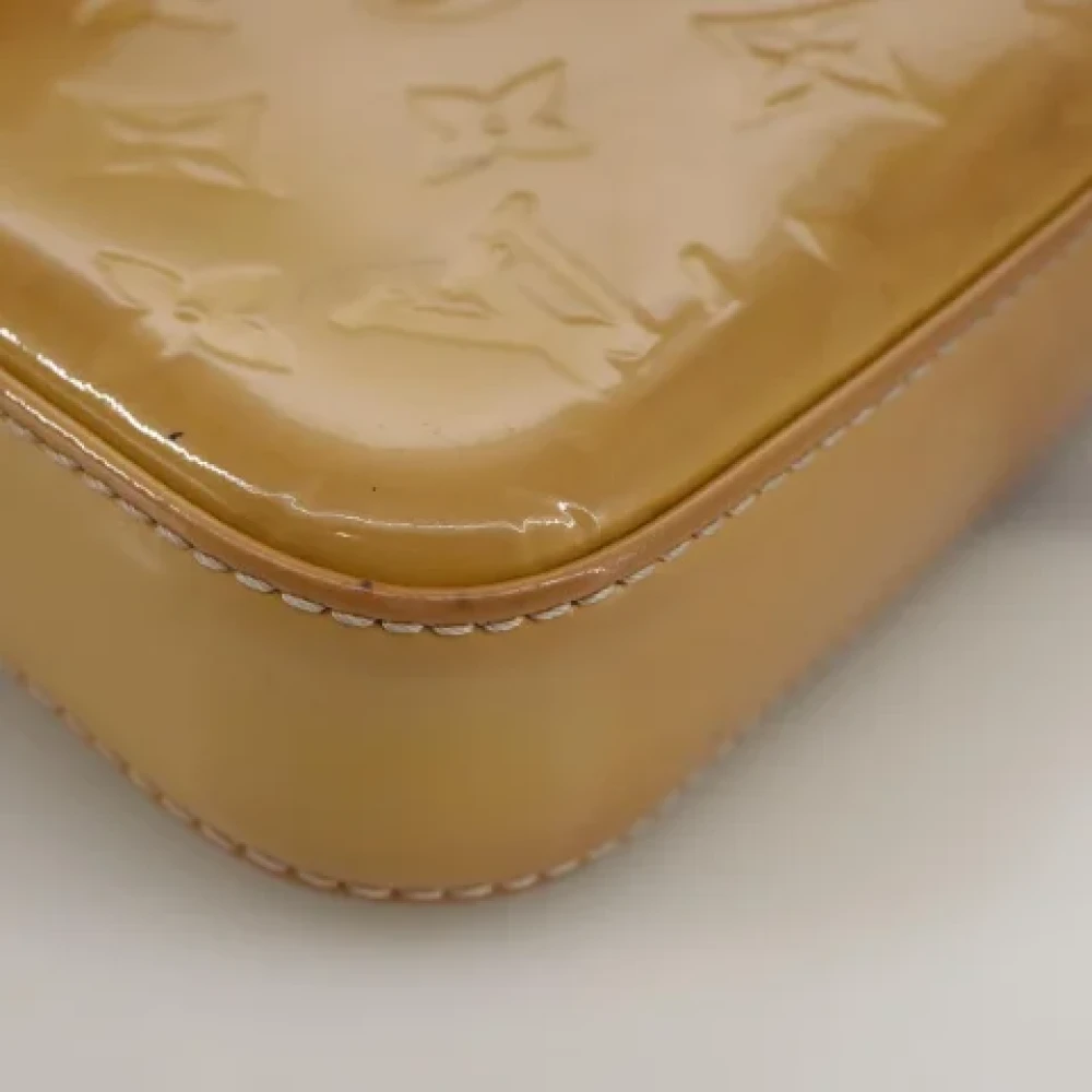 Louis Vuitton Vintage Pre-owned Leather pouches Beige Dames