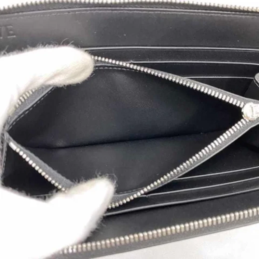 Loewe Pre-owned Leather wallets Black Heren