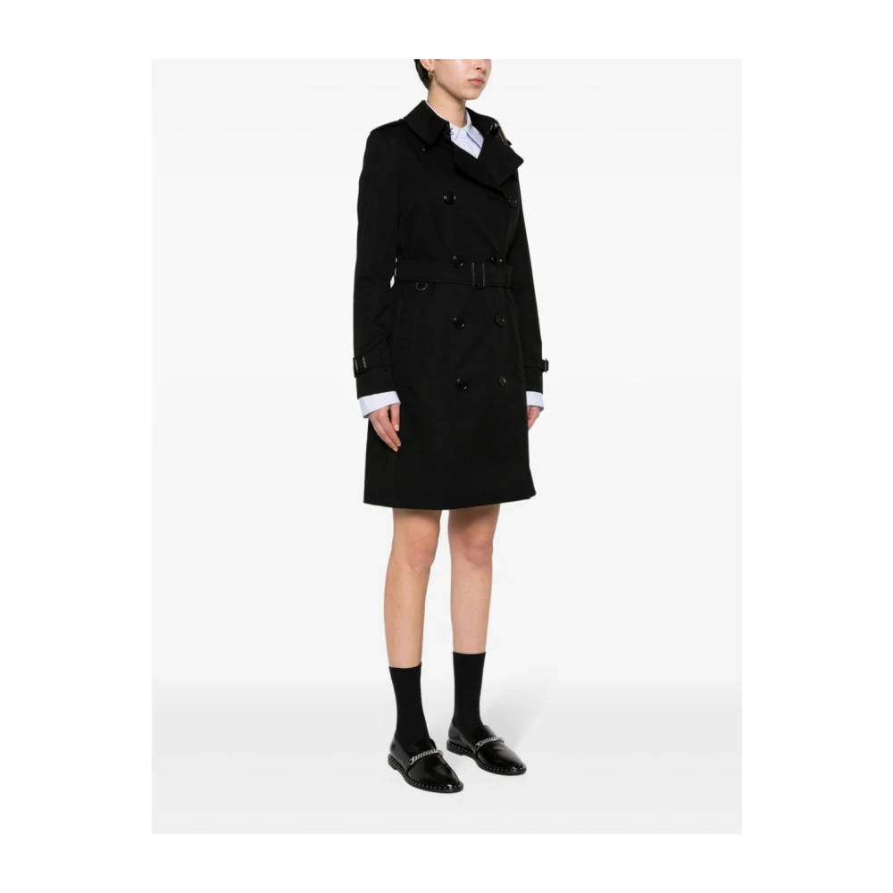 Burberry Zwarte dubbelrij jassen met logo-gegraveerde knopen Black Dames