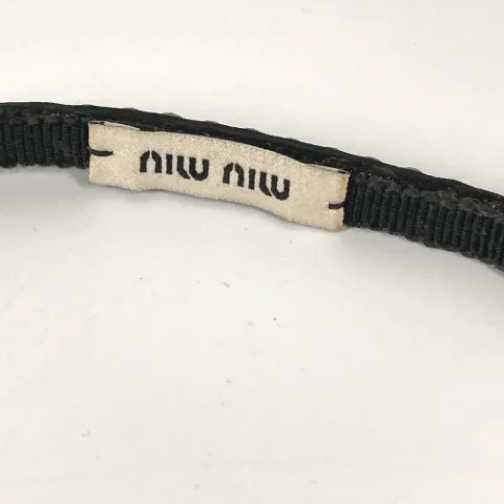 Miu Pre-owned Fabric hair-accessories Black Dames