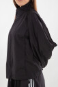 veste-en-nylon-decoupee-noire