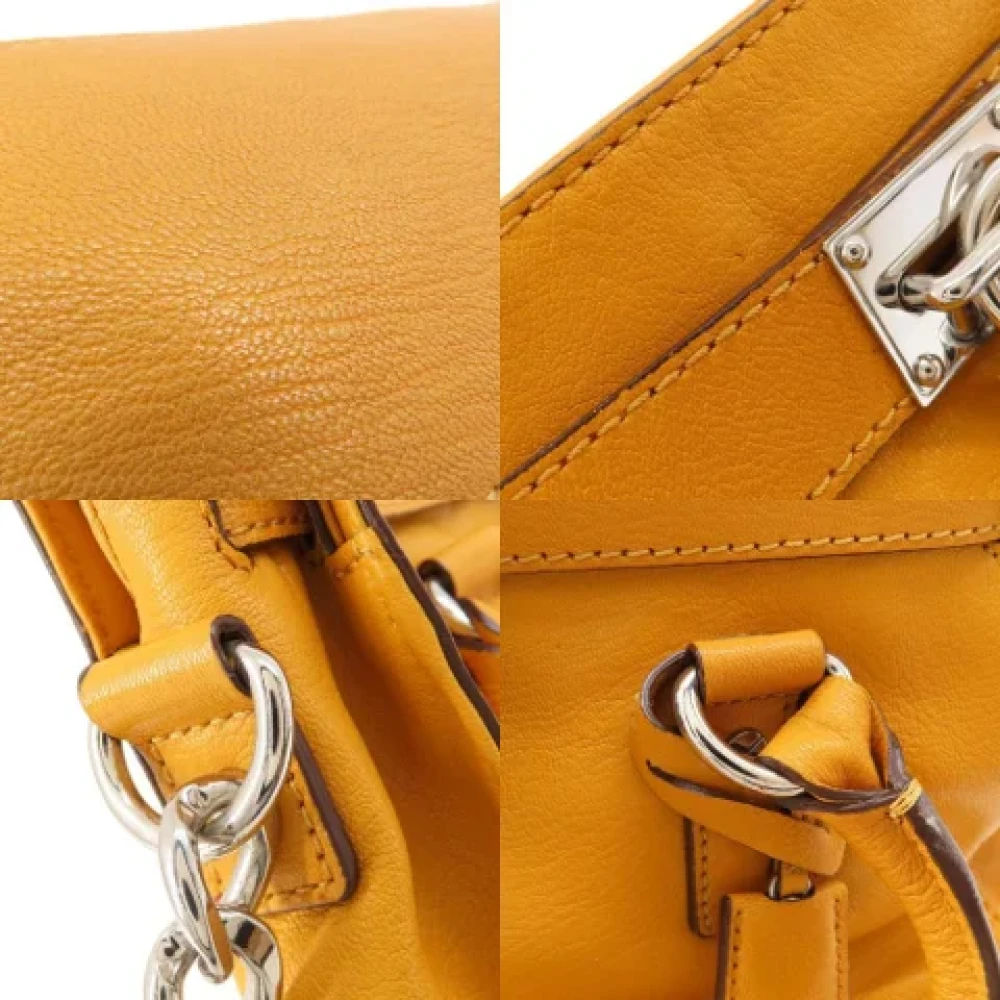 Michael Kors Pre-owned Fabric handbags Yellow Dames