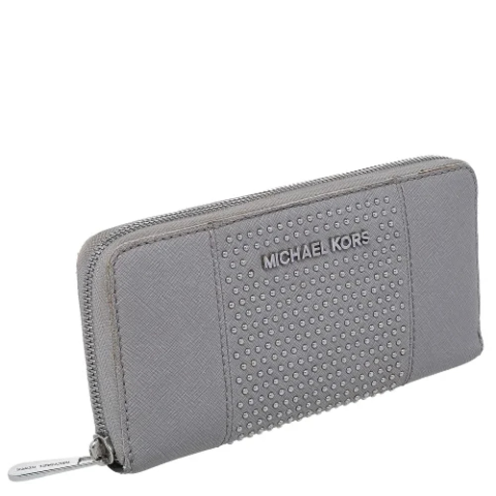 Michael Kors Pre-owned Leather wallets Gray Dames
