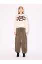 white-sweater-with-boke-flowers