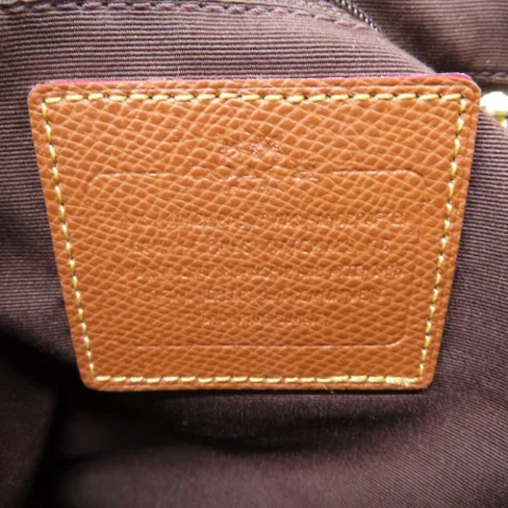 Coach Pre-owned Plastic handbags Brown Dames