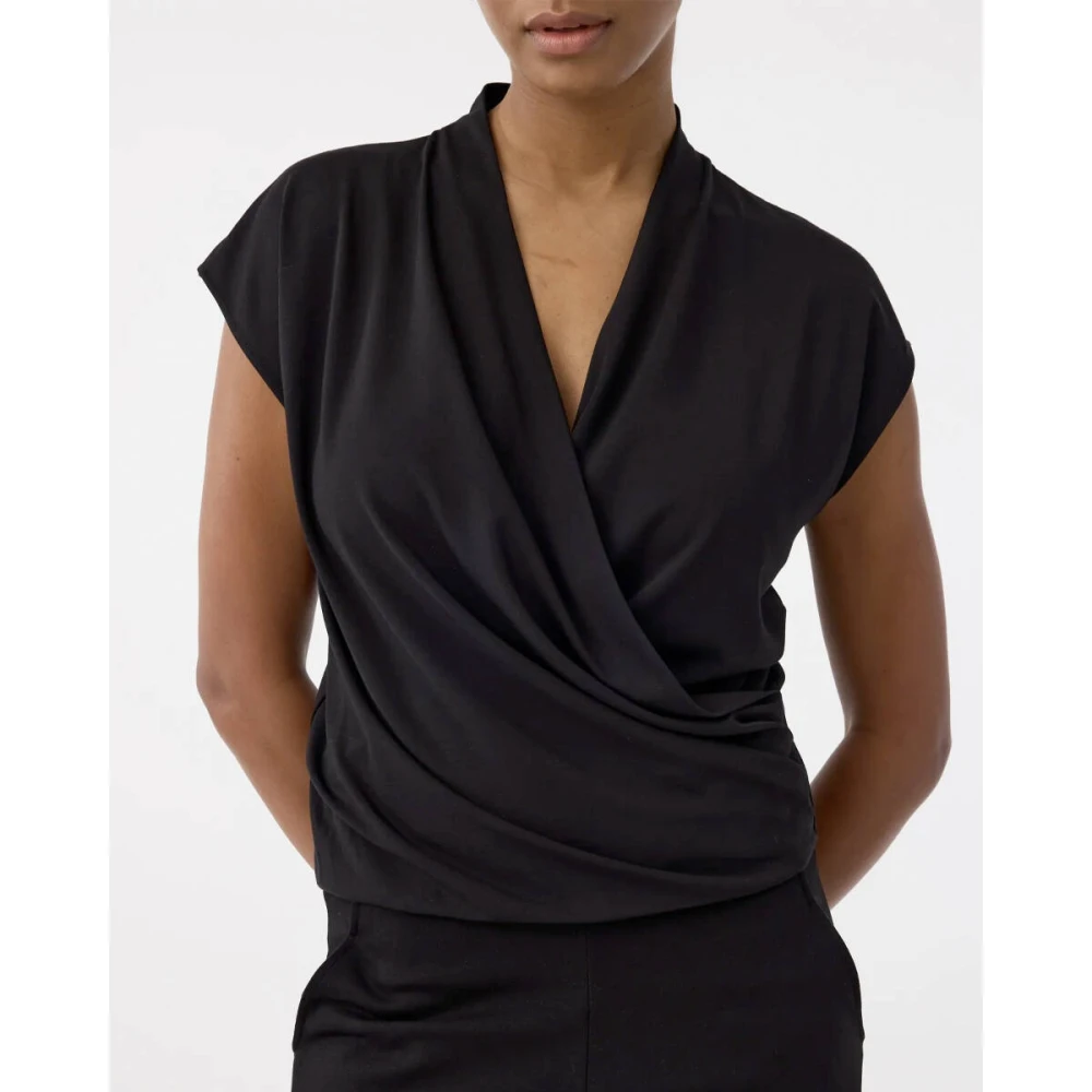 Knit-ted Mouwloze Jet Top Black Dames