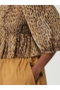 cape-tricotee-beige-a-ouverture-frontale