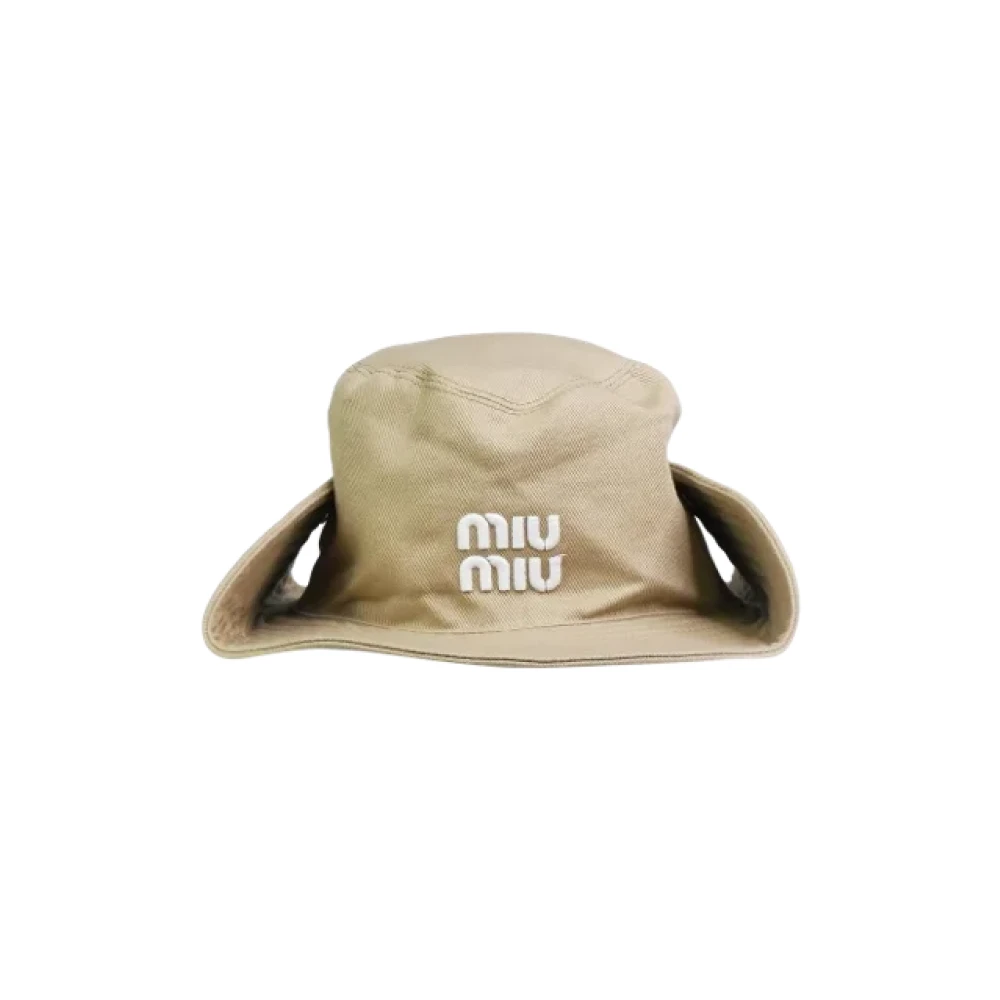 Miu Pre-owned Canvas hats Beige Dames