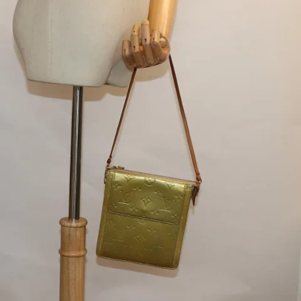 Louis Vuitton Vintage Pre-owned Leather clutches Yellow Dames