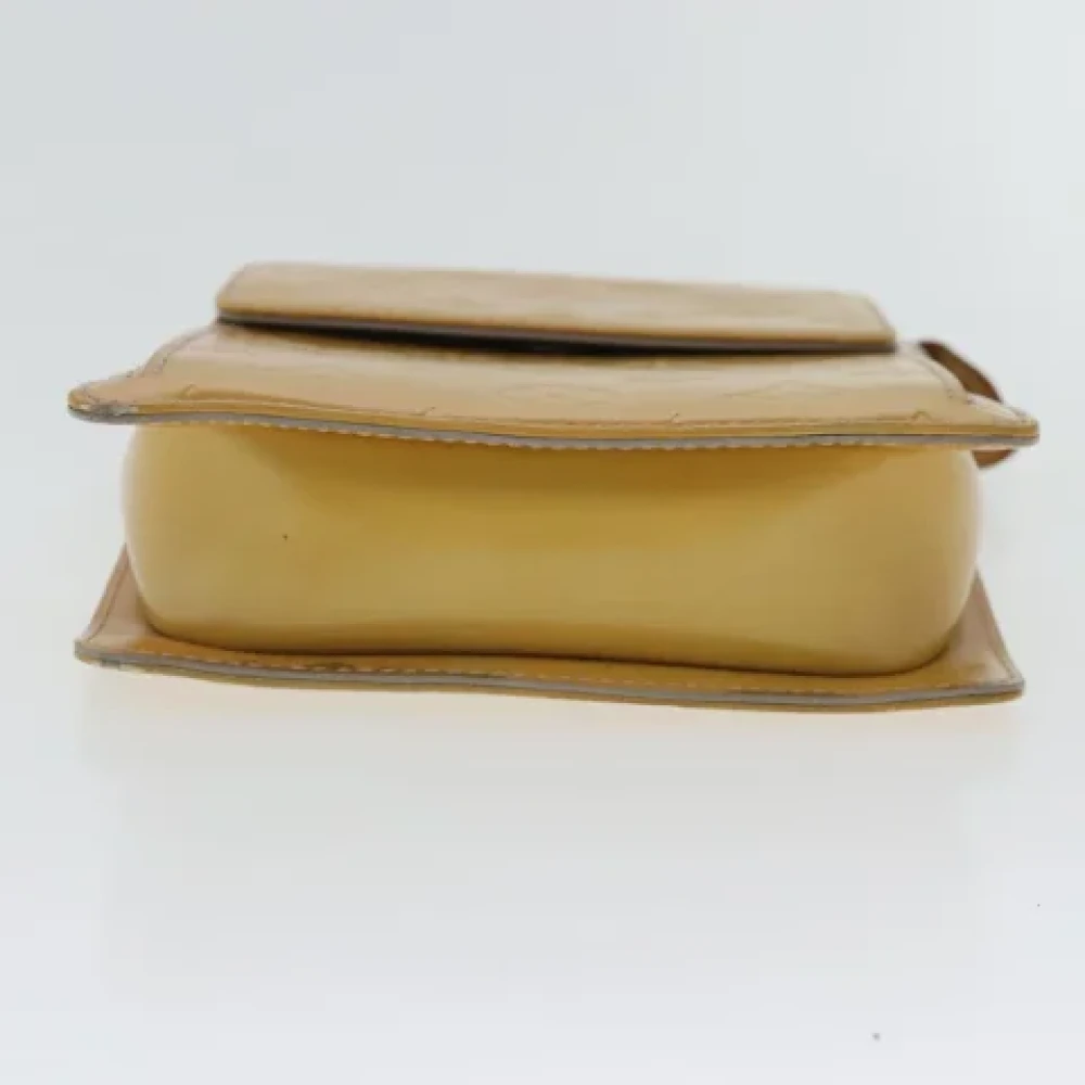 Louis Vuitton Vintage Pre-owned Leather pouches Yellow Dames