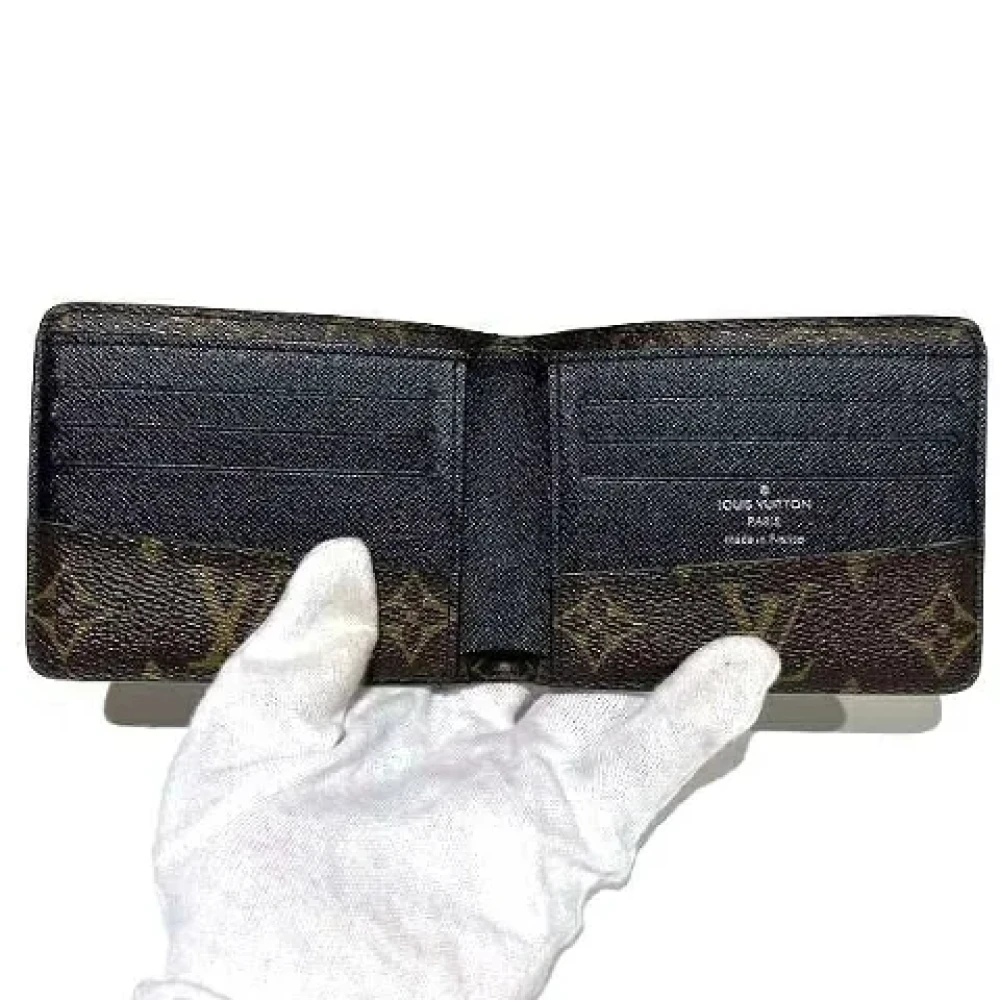Louis Vuitton Vintage Pre-owned Canvas wallets Brown Heren