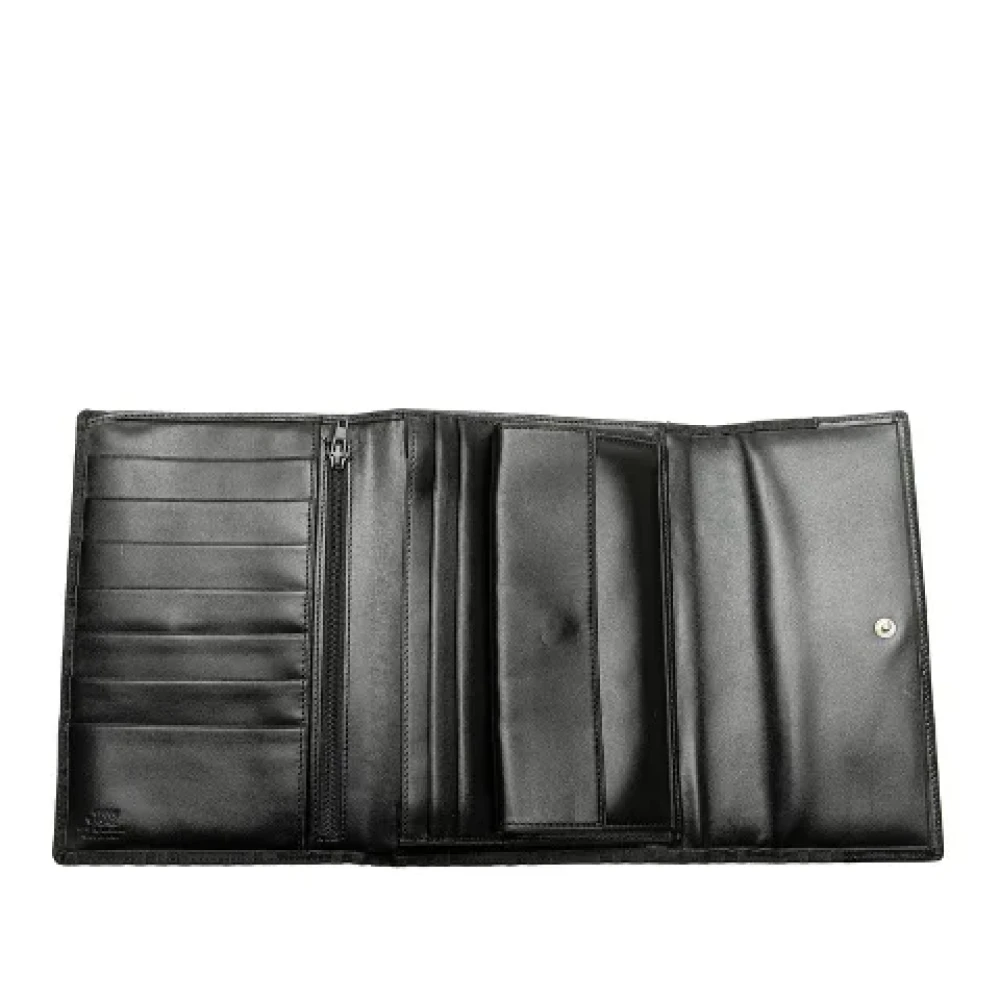 Versace Pre-owned Canvas wallets Black Dames