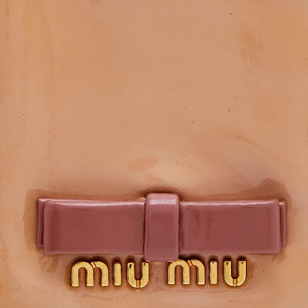 Miu Pre-owned Leather home-office Beige Dames