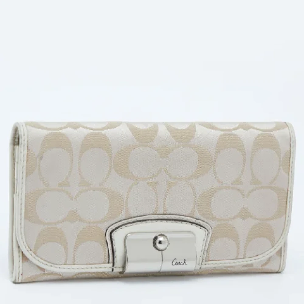 Coach Pre-owned Canvas wallets Beige Dames