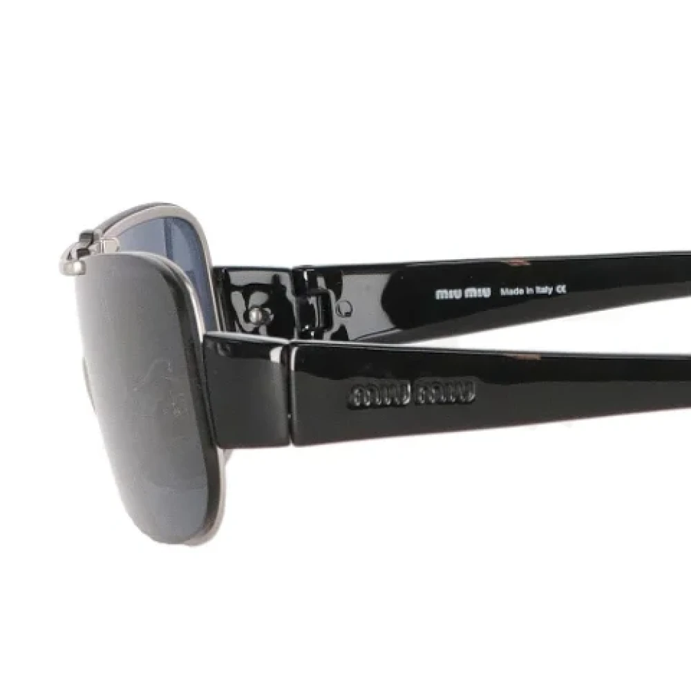 Miu Pre-owned Plastic sunglasses Black Dames