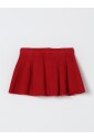 jupe-enfant-plissee-en-rouge-brique