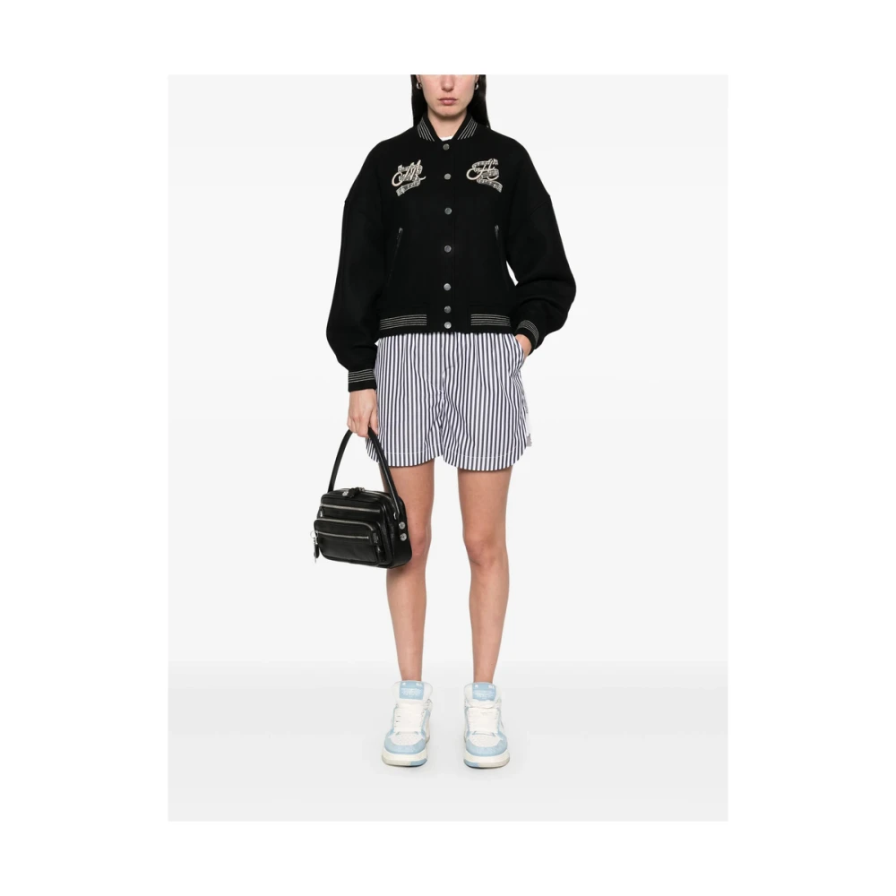Amiri Zwart geribbeld bovenkleding met logoborduursel Black Dames