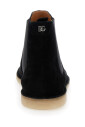 bottes-noires-avec-semelle-en-caoutchouc
