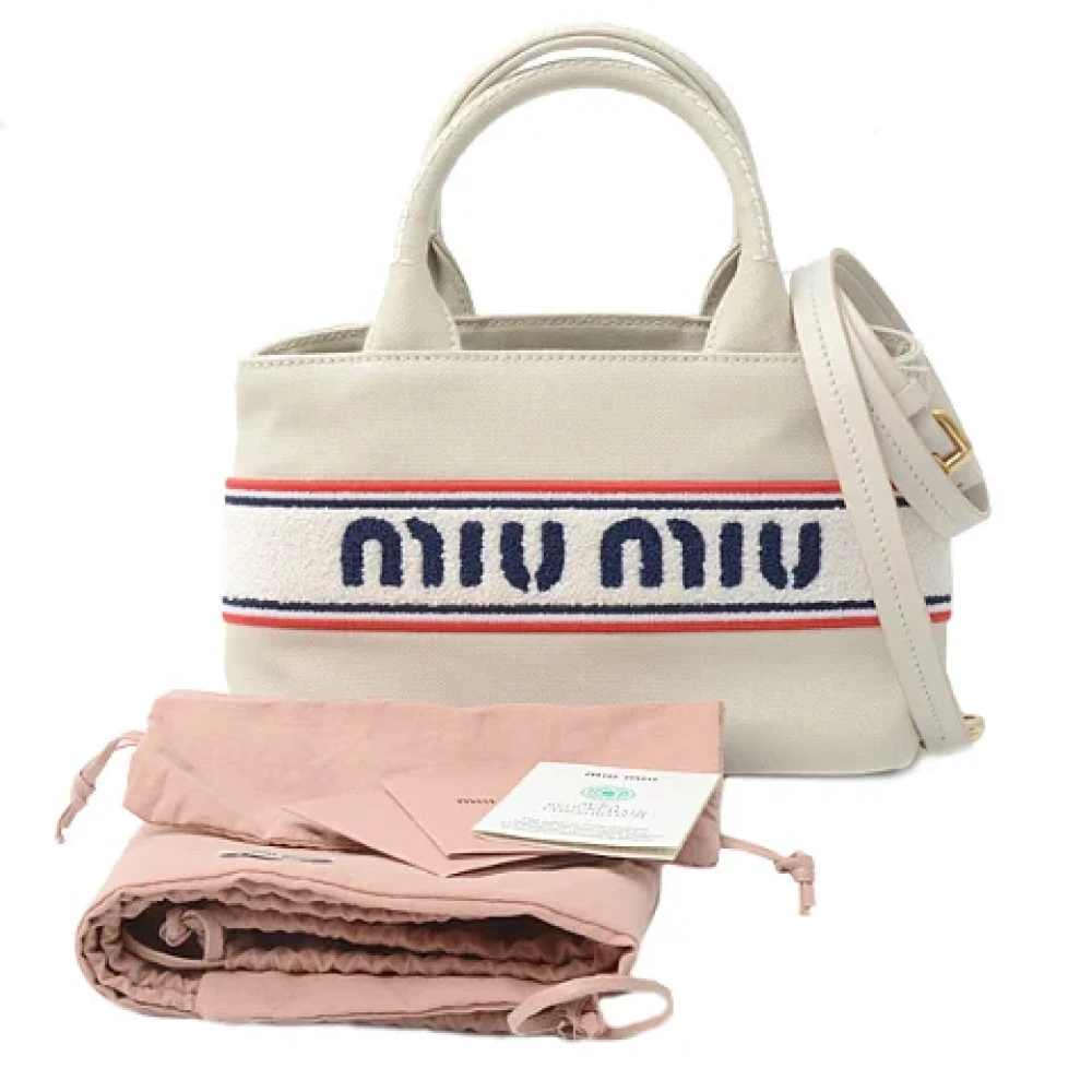 Miu Pre-owned Canvas handbags White Dames