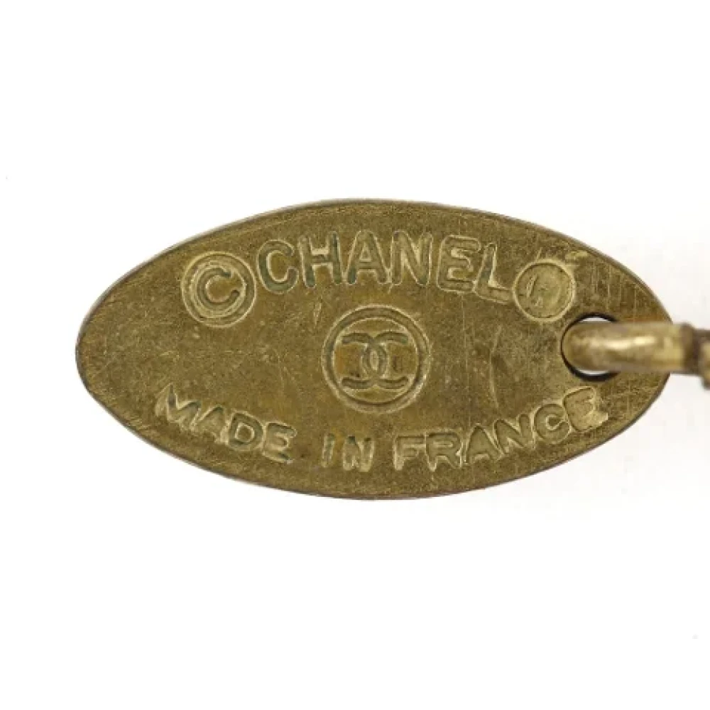 Chanel Vintage Pre-owned Metal key-holders Yellow Dames