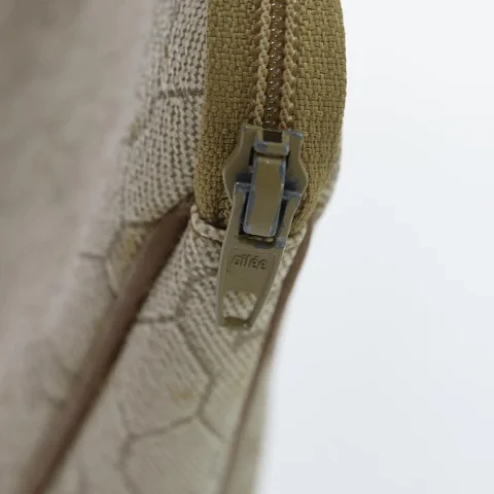Dior Vintage Pre-owned Leather clutches Beige Dames