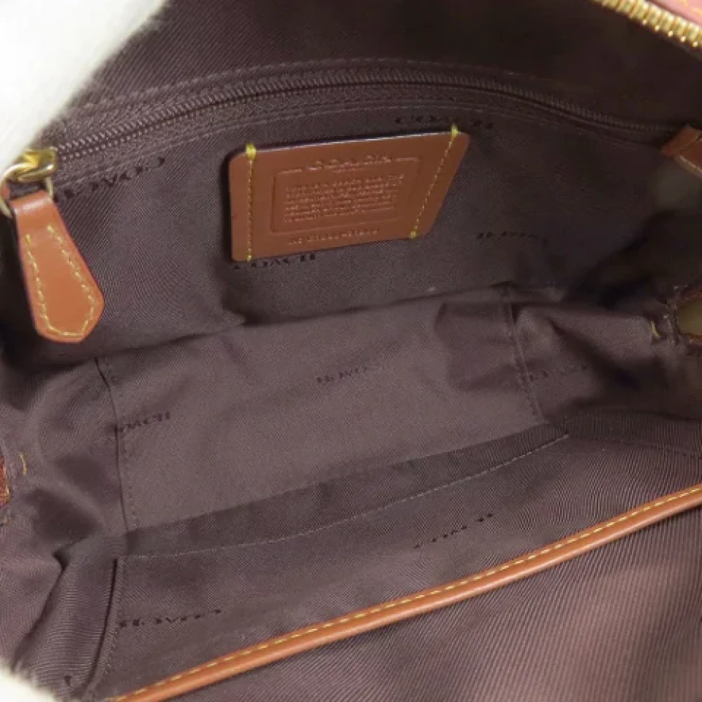 Coach Pre-owned Plastic shoulder-bags Brown Dames